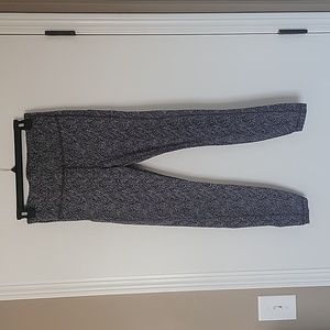 Athleta Ultimate Stash 7/8 tight with pockets. Size M Tall